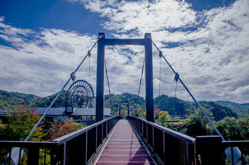 Bridge and water wheel in Yamaoka Ena Japan 