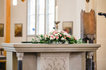 Fototapeta na wymiar wedding church ceremony decoration flowers