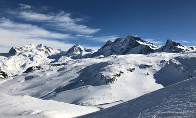 Obraz premium panorama Zermatt small Matterhorn theodul glacier gornergrat view mountain winter snow landscape Swiss Alps clouds