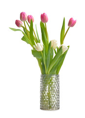 Vase with beautiful tulip flowers on white background