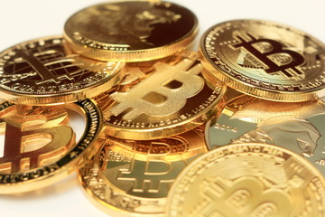 Lots of bitcoin coins on a colored background