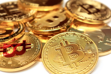 Lots of bitcoin coins on a colored background