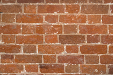 Wall of red brick for the background