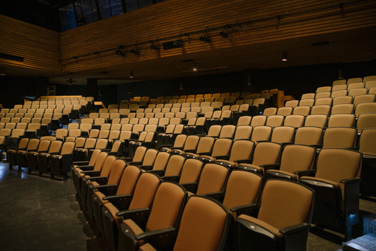 Yellow seats in empty auditorium