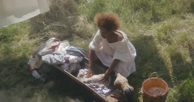 Peasant woman doing laundry