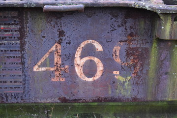 number 4 6 9 in yellow on purple background