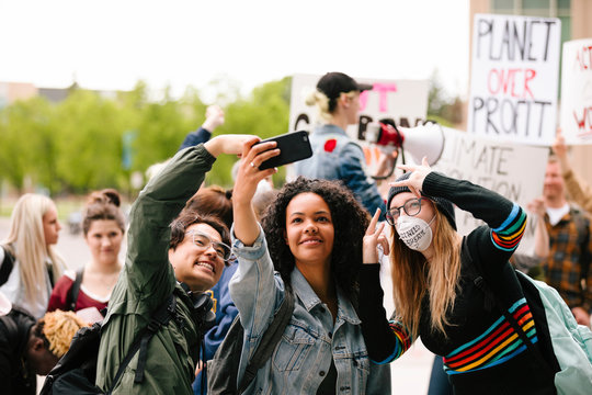 Students taking selfie on protest march