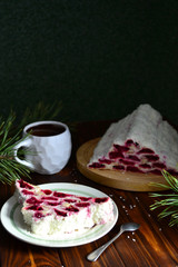 Home made cherry cake Izba on a wooden table.