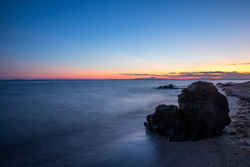 Fototapeta na wymiar Langzeitbelichtung eines Sonnenunterganges am Meer