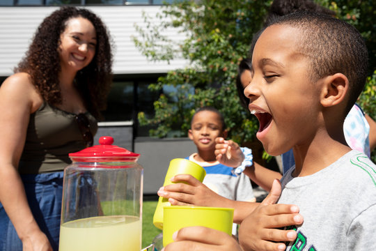 Happy Boy Serving Lemonade At Sunny, Summer Lemonade Stand