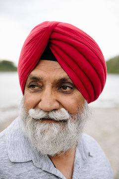 Portrait of Indian man wearing red turban