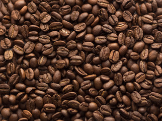 Texture of coffee beans. Brown coffee beans. Close up