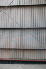 gray walls of industrial metal hangar