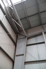 gray walls of industrial metal hangar