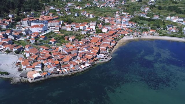Panorama of Combarro with traditional houses and horreos. Spain. Aerial shot