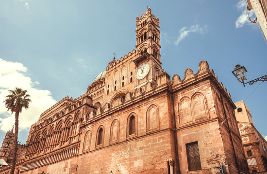 Landmark of Palermo, the 18th century Palermo Cathedral with clock tower, Sicily. UNESCO World Heritage Site. Arab-Norman architecture style. - Powered by Adobe