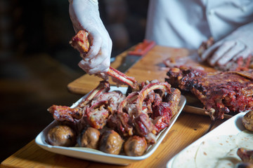 Barbecue is prepared of lamb or sheep meat and processed by slasher. Antrikot and potato kebabs are...