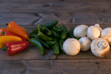 pepper and mushrooms on the board