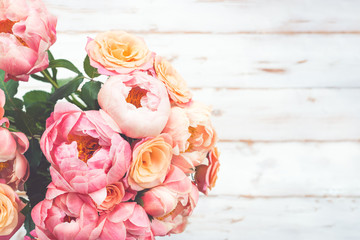 Fresh bunch of pink peonies and roses. Toned image, card Concept, pastel colors