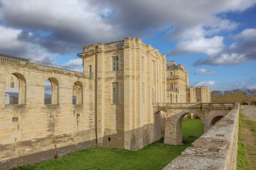Fototapeta premium Access bridge with part of the south side of the Chateau de Vincennes, seen from the street