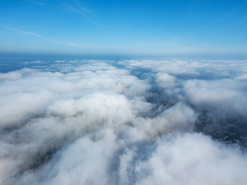 Aerial Flight Above Clouds.