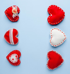 Valentine's day background. Various  hearts on a blue background. Valentine's day concept. Flat lay, top view, copy space.