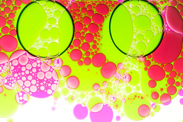 Abstract  macro shot of the colored drops of a liquid motion bubbler 