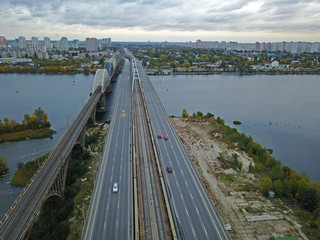 Aerial drone view. Darnitsky railway and automobile bridge in Kiev.