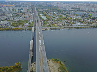 Aerial drone view. Darnitsky railway and automobile bridge in Kiev.