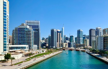 Obraz na płótnie Canvas View on the canal and buildings in Dubai