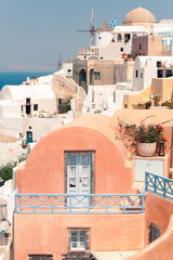 Classic view on the buildings and decoration at the FIra - capital of Santorini, Greece