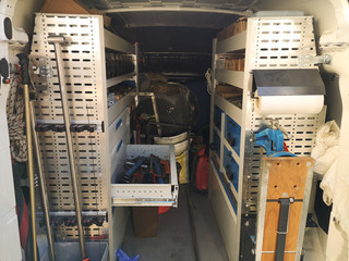 interno di un furgone allestito per lavoro di idraulico ed emergenze - obrazy, fototapety, plakaty