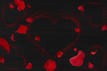 Red roses and red heart on black wood decoration. Valentine background.