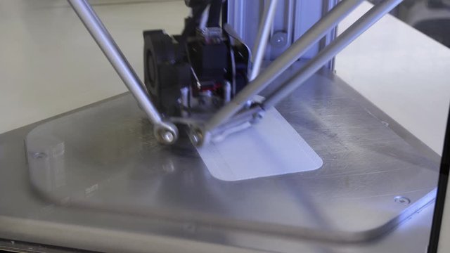 3d printer working with a model in time lapse speed. Fab Lab educational use.