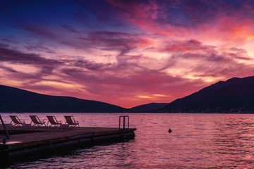 Sunset view of Kotor bay and mountains near Tivat, Montenegro.