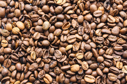 Coffee beans scattered on the surface, coffee bean texture