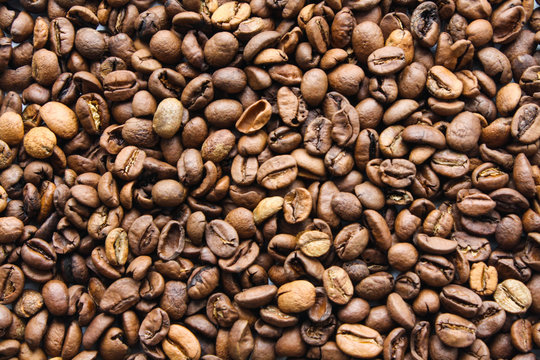 Coffee beans scattered on the surface, coffee bean texture
