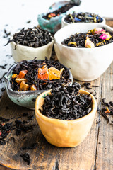 Tea varieties on stone background