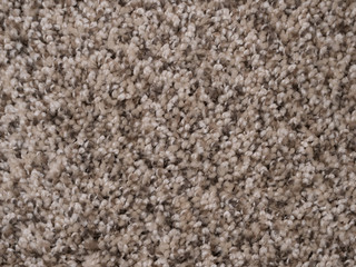 Macro closeup soft brown carpet rug texture