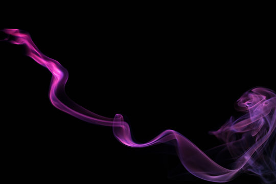 Fototapeta Purple smoke on black background