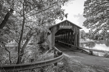 The historical Fallasburg covered bridge remains open to auto traffic and is located about 30 minutes from the city of Grand Rapids in Lowell Michigan