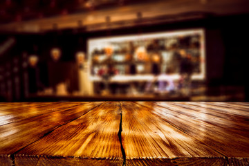 Table background of free space and blurred bar background 