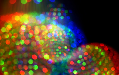 Abstract de-focus soft blinking sphere on black Background.