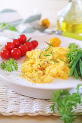  Scrambled eggs, green beans and cherry tomatoes for healthy breakfast