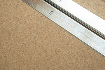 Building construction materials chipboard with tin metal, copy space.