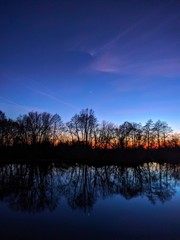 Fototapeta premium sunset over lake