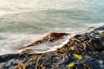waves on rocks