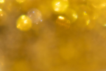 Light sparkle background with bokeh and bright 