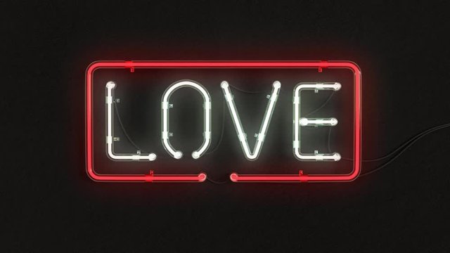 LOVE neon sign on wall