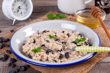 Bowl of oatmeal with raisins